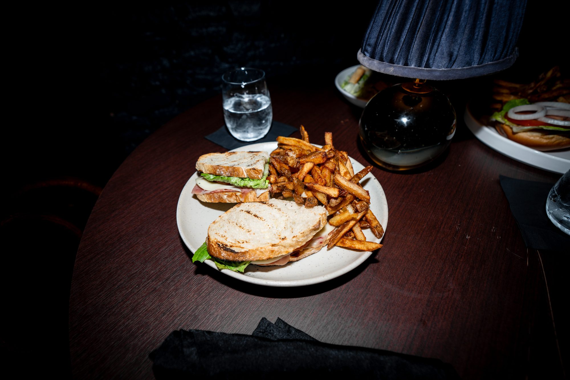 House sandwich served with hand-cut fries