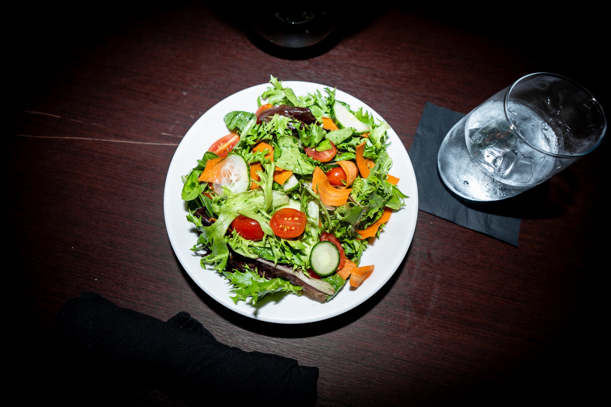 Fresh garden salad with cherry tomatoes and seasonal vegetables