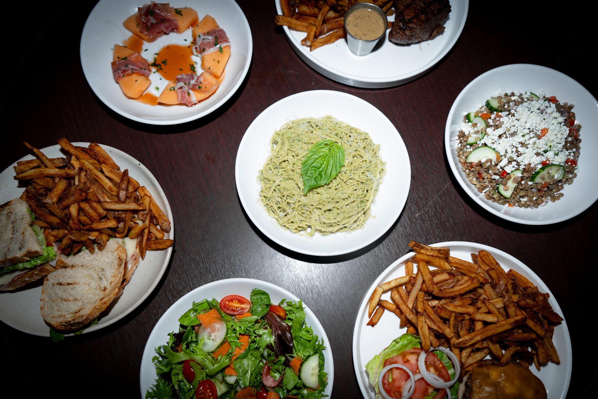 A spread of Estelle's Oxford dishes shared across the table