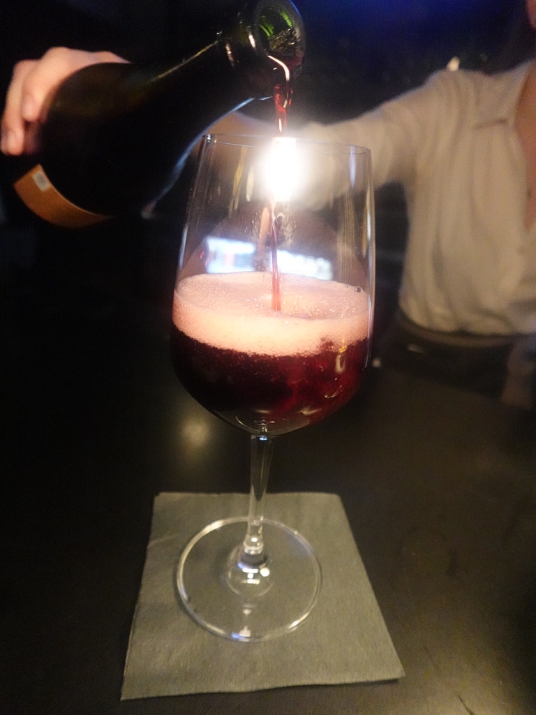 Wine being poured tableside at Estelle's Oxford